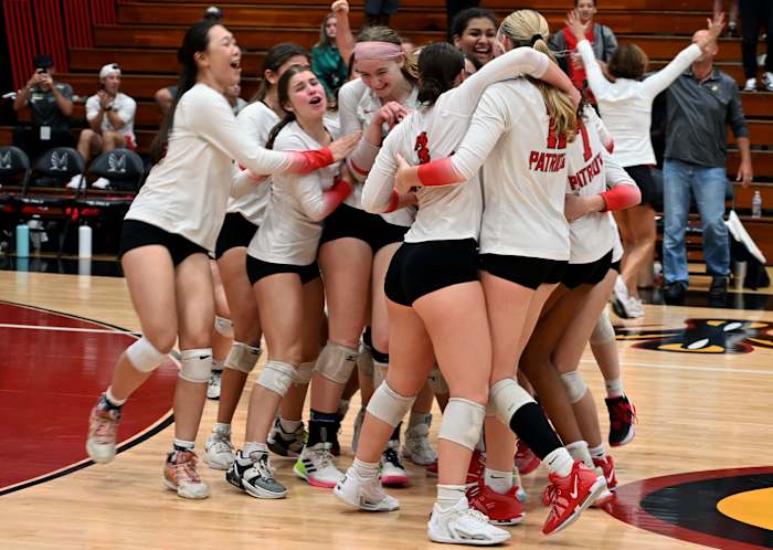 Carrollwood players celebrate winning the Class 3A state championship match on Thursday at the FHSAA girls volleyball state finals at Polk State College in Winter Haven.